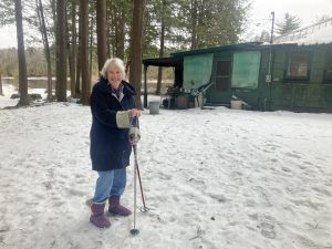 Mom checking out the snow conditions at Camp High Skies